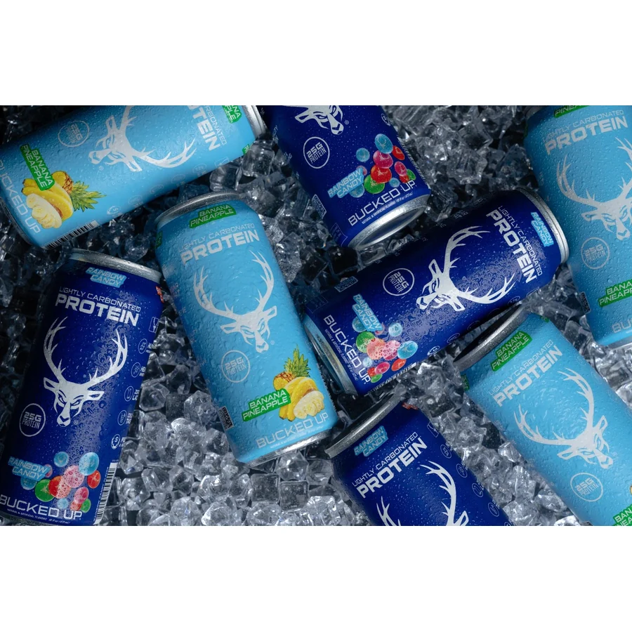 Bucked Up Protein Soda cans lying in crushed ice