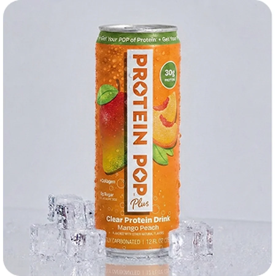 Protein Pop Plus Mango Peach can standing on ice cubes against a pale grey background